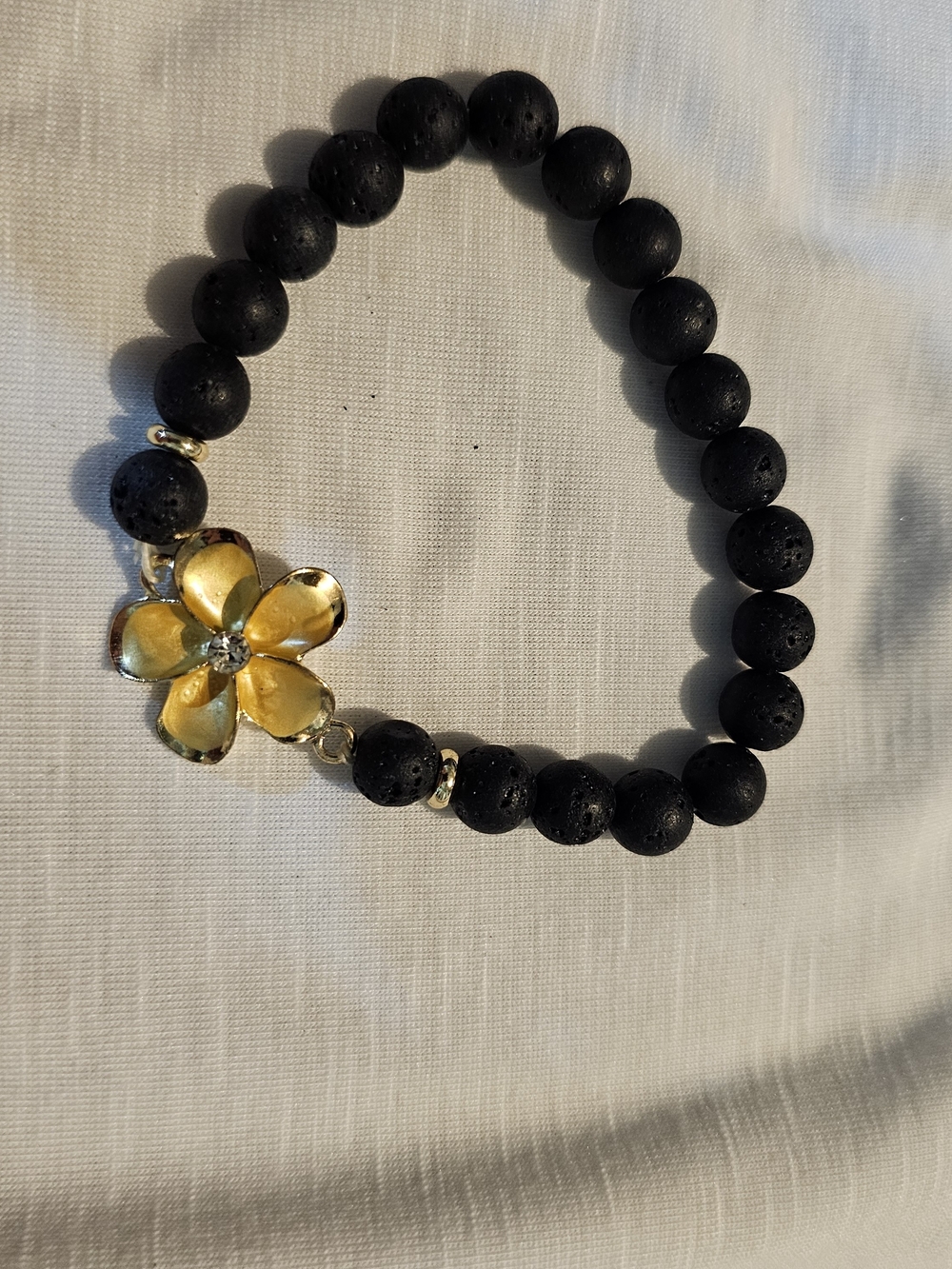 Black Beaded Bracelet with Yellow Flower Charm